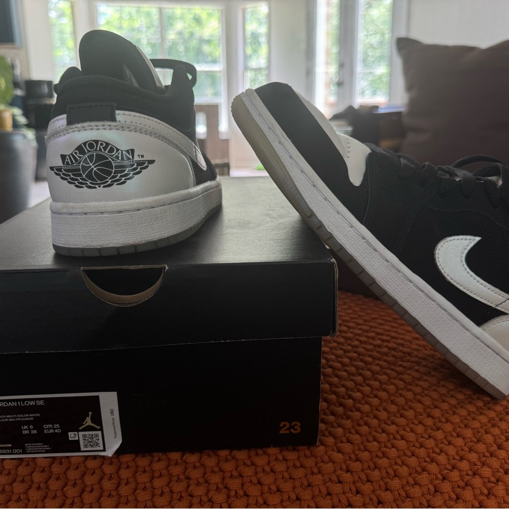 Jordan Black and White High-Top Sneakers